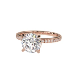 Four-claw engagement ring with micro-set accents